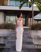 Vestido longo com transparência geométrica