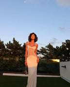 Vestido longo com transparência geométrica